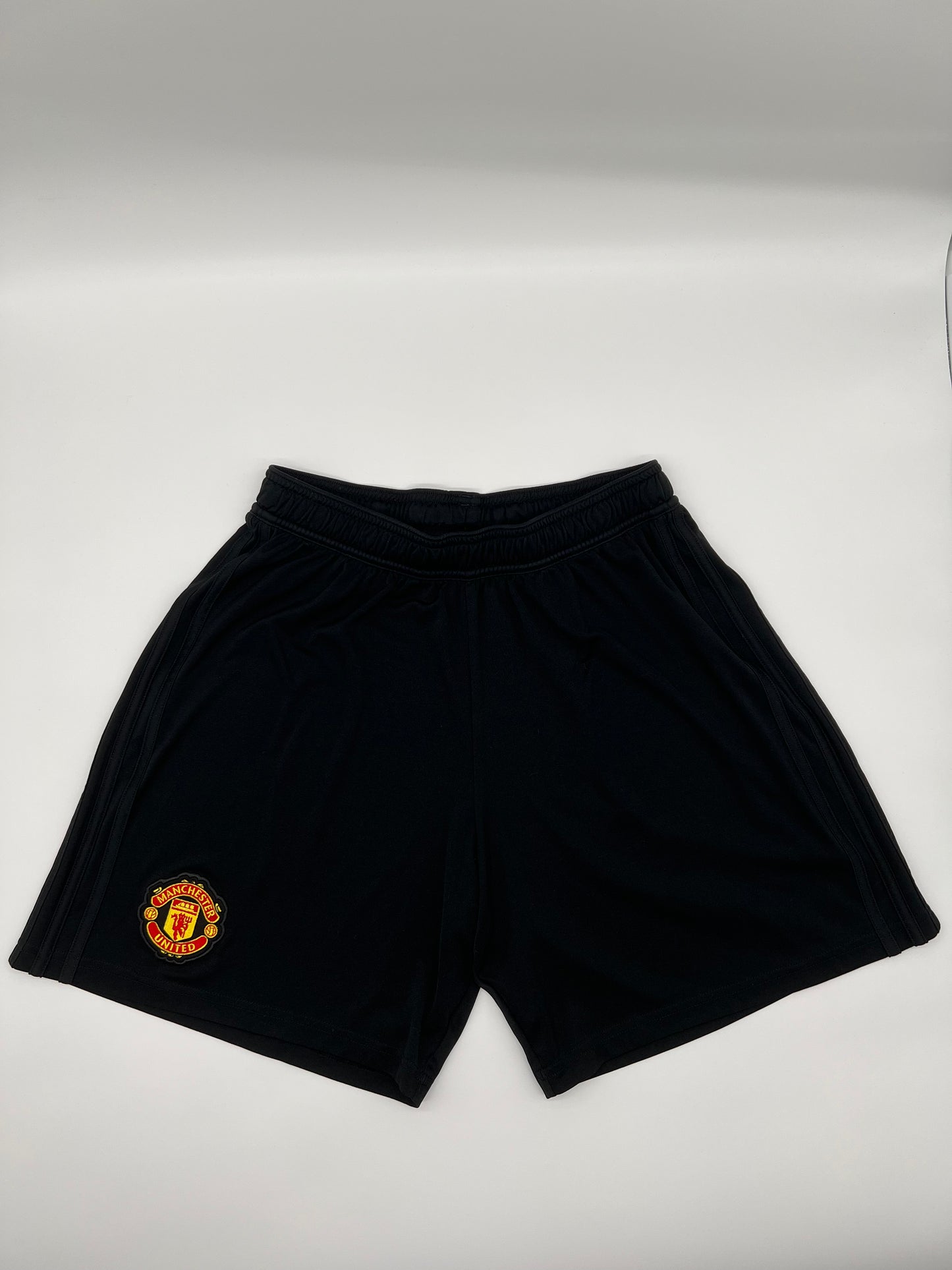 Ensemble maillot/short/chaussettes Manchester United rouge/noir